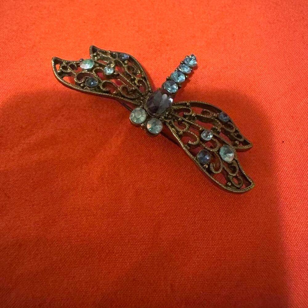 Dragonfly brooch with blue rhinestones & metal body